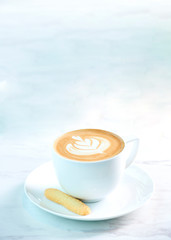 Hot latte art coffee with cookies on marble background. - Image