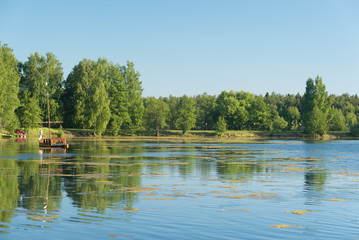 Fototapeta na wymiar Blue lake in forest, Russian landscapes, beautiful nature