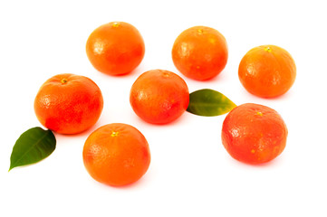 Pattern of orange mandarins on white  background. Copy space. Closeup
