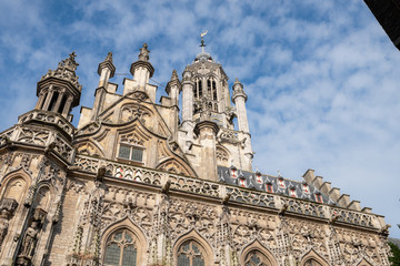 Fototapeta premium Side view of the beautiful Middelburg Town Hall against the sky, Netherlands