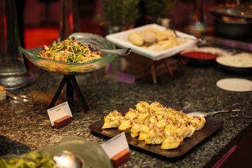 Plates with food at the party