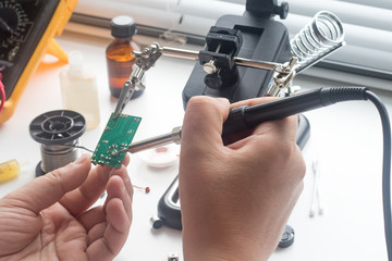 Repair of the radio board by soldering using a soldering station and other components