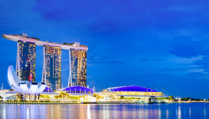 SINGAPORE, SINGAPORE - MARCH 2019: Skyline of Singapore Marina Bay at night with Marina Bay sands,...