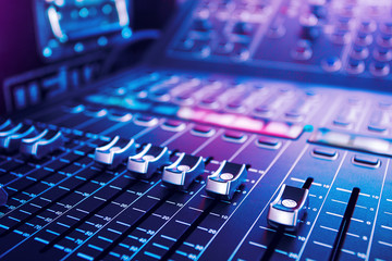 Dj equipment professional sound panel on the audio mixer, Concept sound engineer nightlife party background.