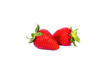 Strawberries on a white background. Group of red strawberries on a white background. Two juicy strawberries on an isolated white background.