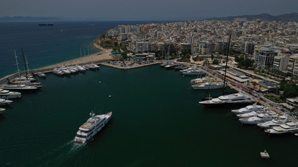 Fototapeta na wymiar Aerial view photo of luxury yacht entering Marina Zeas, Piraeus, Attica, Greece