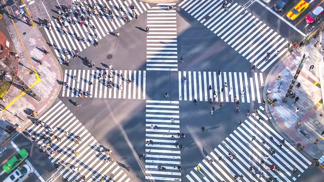 4K,Time lapse traffic and crowd people at ginza district intersection in Tokyo of Japan