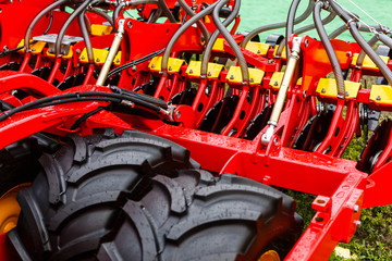 Close up of pipe system of hydraulic valves in agricultural machinery