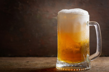 mug of beer on a wooden table