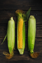 Corn on a dark wood background
