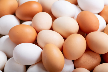 fresh eggs as background, top view