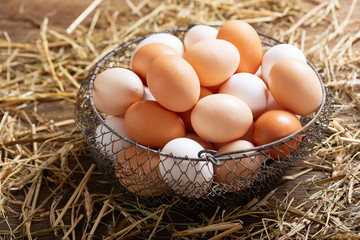 basket of colorful fresh eggs