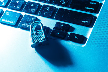 security lock on a computer keyboard - computer security concept