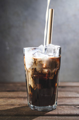 Fresh tasty iced coffee with milk