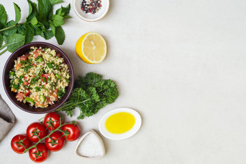 Lebanese traditional salad taboule soaked bulgur and ingredients