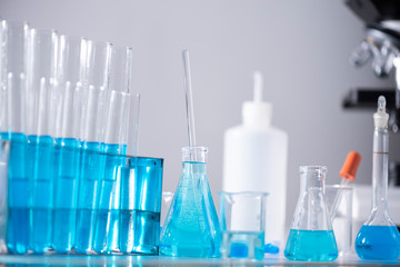 Chemical laboratory equipment Glassware for research and blue matter
