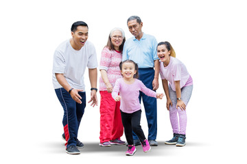 Obraz premium Happy little girl playing with her family on studio