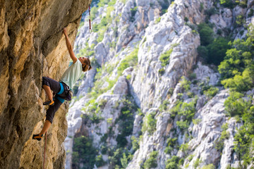 Climber trains on the rocks of Croatia.