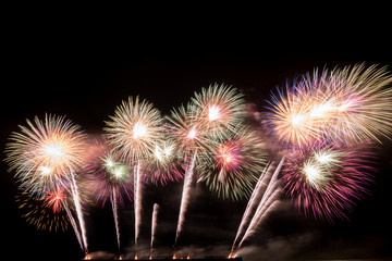 row of fire work on black background