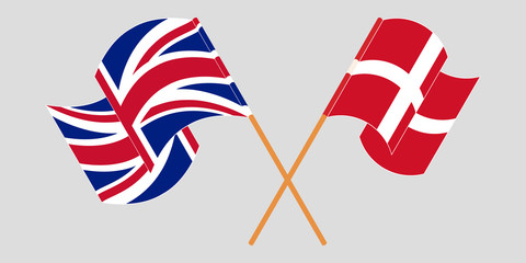 Crossed and waving flags of Denmark and UK