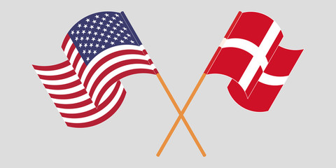 Crossed and waving flags of Denmark and USA