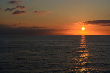 Naklejka premium A beautiful sunrise over the north sea viewed from a ship