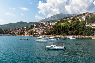 Fototapeta na wymiar Yachts in port on the background of the Herceg Novi, Montenegro