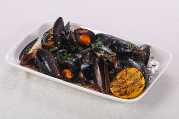 Tasty delicous boiled Mussels with herbs