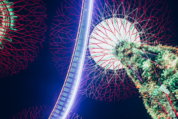 SINGAPORE, SINGAPORE - MARCH 2019: Supertree Grove & OCBC Skyway illuminated for light show in...
