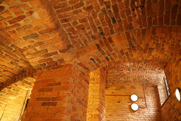 old building of red retro brick inside. nobody