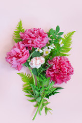 Beautiful floral composition, bouquet of blooming peonies and roses