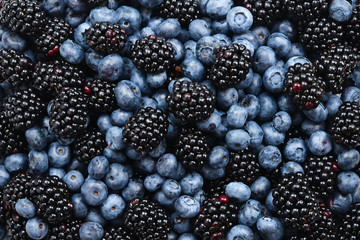 Blackberry and  blueberry background. Top view.