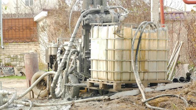 modified forklift into the device to create wells