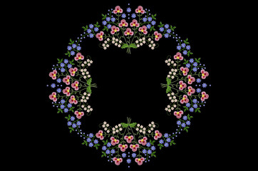 Black background with oval pattern for embroidery out bouquets with pink, blue and white flowers on twigs with leaves