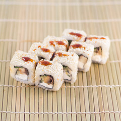 Isolated sushi / rolls.