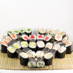 Isolated sushi / rolls.