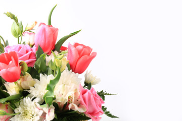 bouquet of different flowers on a white background