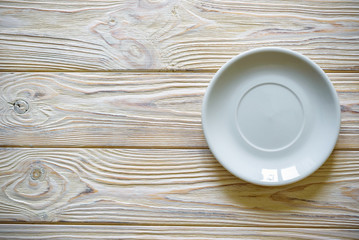 Top view with copy space white Empty plate on concrete floor background