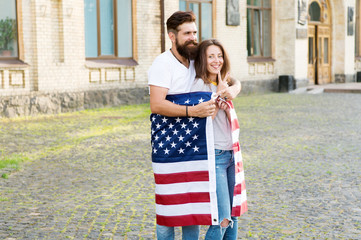 Emigration from the native country. Happy couple of emigrants on independence day of the us....