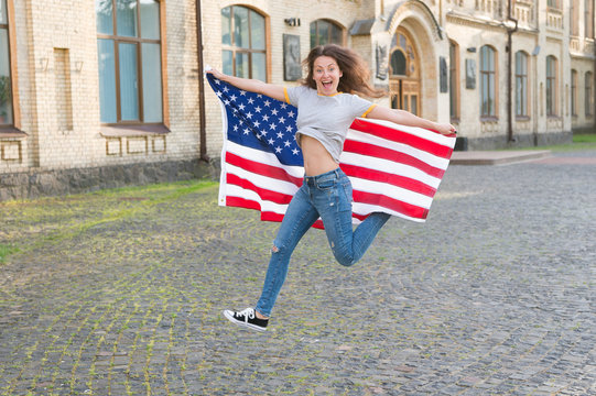 Being Free And Live Life Fully. Happy Girl Jumping Free With American Flag Outdoor. Sensual Woman Celebrating Freedom And Independence. Rights Of Conscience And Free Will. Free And Independent