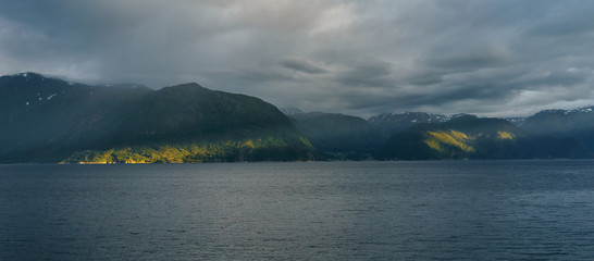 spellbinding landscape of Norwegian nature with high charming mountains and hills, wonderful rivers in which it is impossible not to fall in love