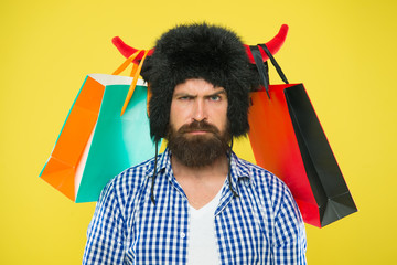 Wild about shopping. Shopping concept. Guy shopping sales season with discounts. Full packages of...