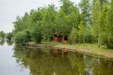 Fototapeta premium Holiday house near the lake. The concept of fishing and recreation