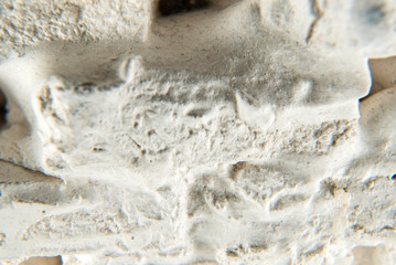 white geometric plaster texture