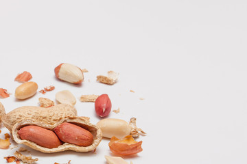 Large peeled peanuts close-up of beans in the shell. Unpeeled peanuts in the shell. Peanuts, for...