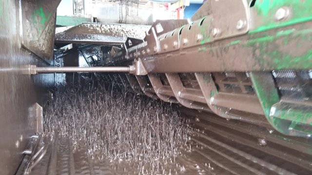 Shale shaker on an offshore oil rig separating the cutting from oil based mud