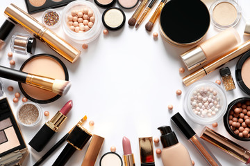 Different luxury makeup products on white background, top view. Space for text