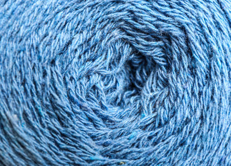 Fototapeta premium Clew of knitting threads as background, top view. Sewing stuff