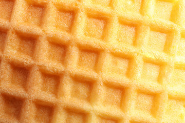 Delicious waffle for breakfast as background, closeup