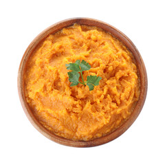 Bowl with mashed sweet potatoes on white background, top view